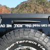 If you can read this roll me over decal - https://customstickershop.us/product-category/windshield-decals/