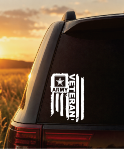 Dark SUV with a white 'ARMY VETERAN' decal featuring a star and vertical stripes on the rear window at sunset, conveying veteran pride.