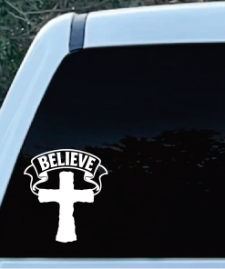 Religious decal on a car window: white cross with a BELIEVE banner above it