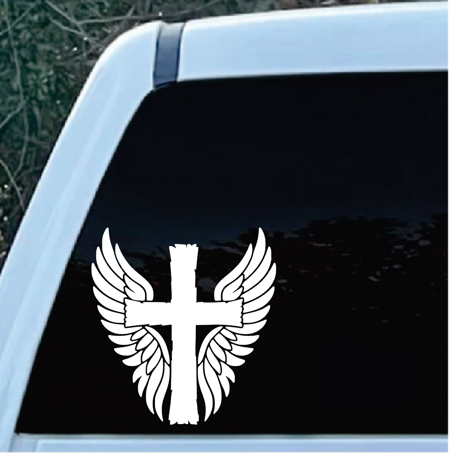 Cross and angel wings decal sticker | Custom Sticker Shop White cross with wings decal on a car window, viewed from outside.