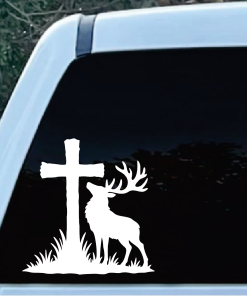 Stag Cross Window Decal Sticker | Custom Sticker Shop White silhouette of a deer with large antlers standing beside a cross on a grassy mound, as a vinyl sticker on a car window.